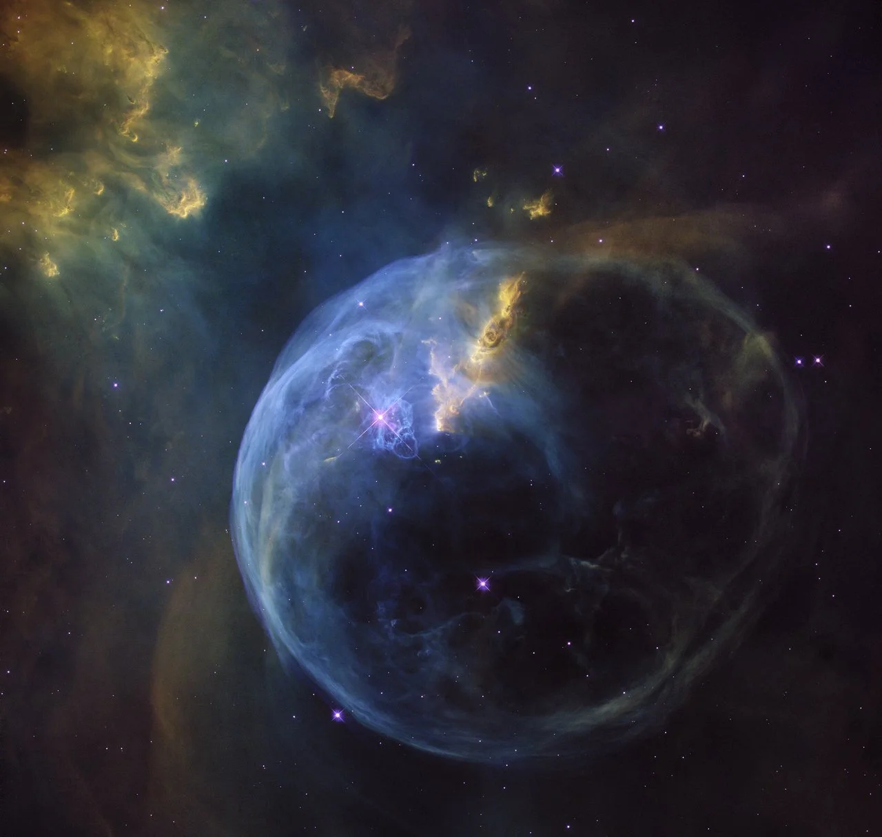 The Bubble Nebula, also known as NGC 7653, is an emission nebula located 8 000 light-years away. This stunning new image was observed by the NASA/ESA Hubble Space Telescope to celebrate its 26th year in space. – Image Credit: NASA, ESA, Hubble Heritage Team
