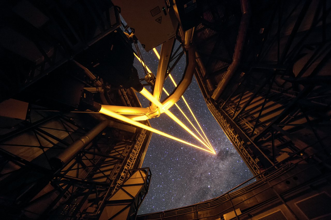This spectacular image shows the four beams emerging from the new laser system on Unit Telescope 4 of the VLT. – Image Credit: ESO/F. Kamphues
