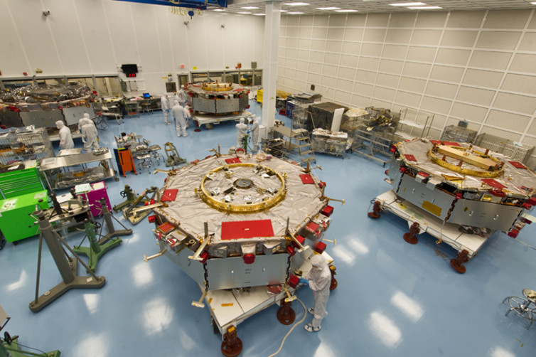 The four spacecraft of the MMS mission getting prepared for stacking operations. - Image Credit: NASA/Flickr , CC BY-SA