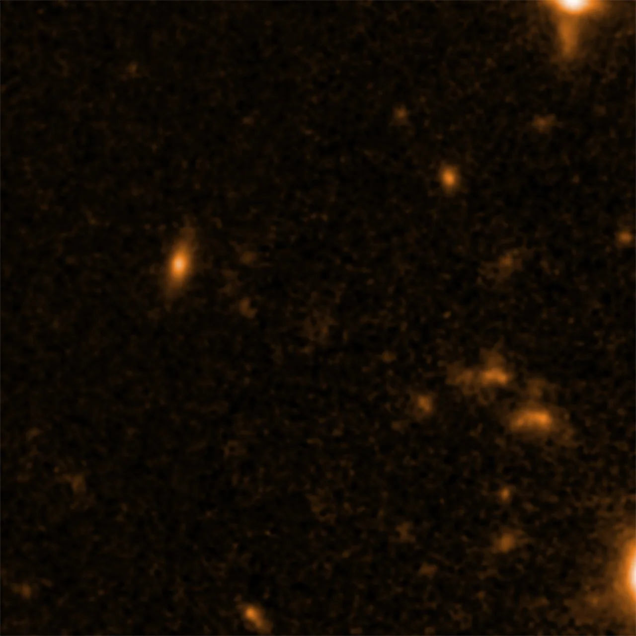 This image shows one of two detected supermassive black hole seeds, OBJ29323, as it is seen by the NASA/ESA Hubble Space Telescope. – Image Credit: NASA/STScI/ESA