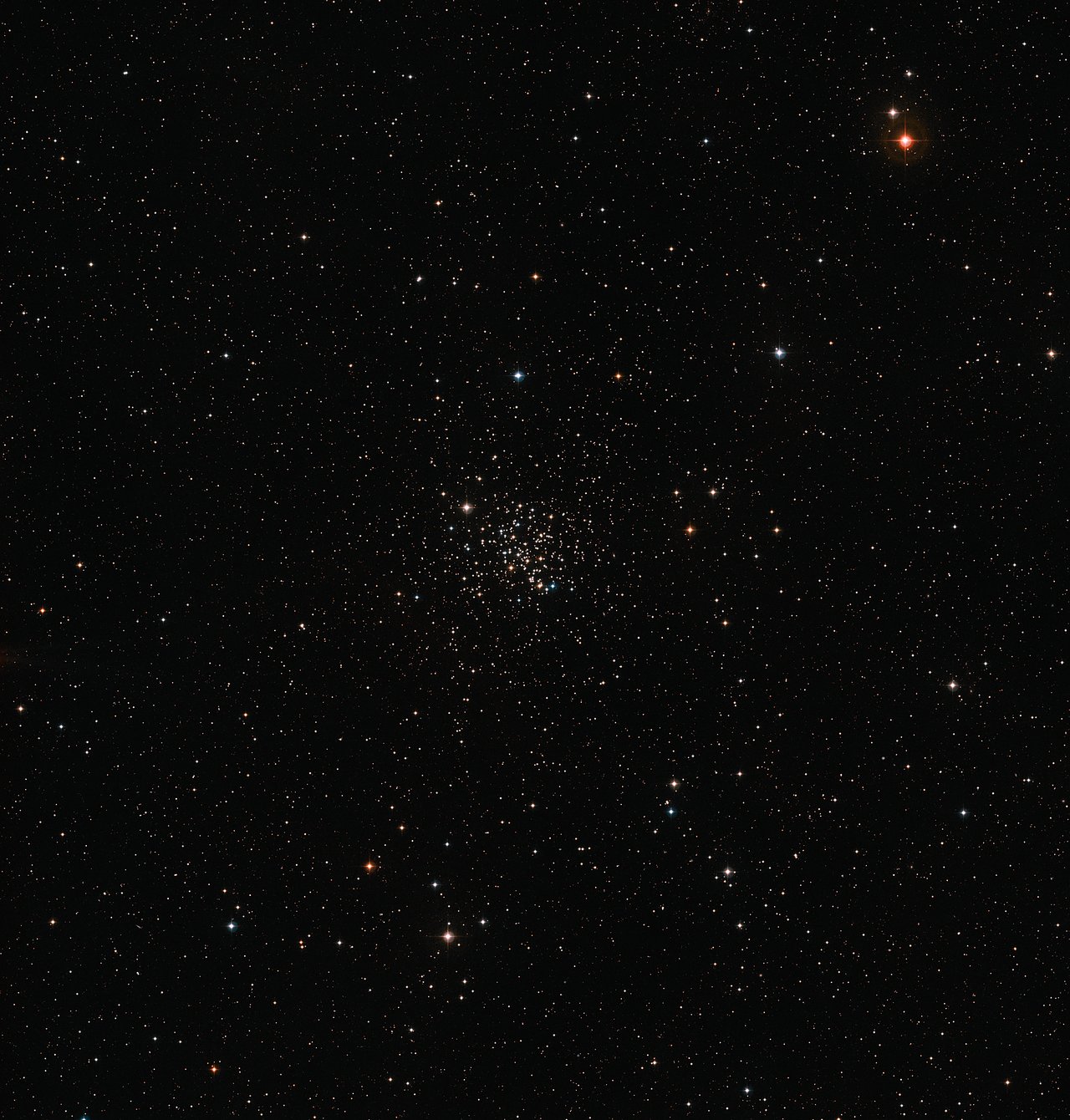 This wide-field image of the sky around the old open star cluster Messier 67 was created from images forming part of the Digitized Sky Survey 2. The cluster appears as a rich grouping of stars at the centre of the picture. Messier 67 contains stars that are all about the same age, and have the same chemical composition, as the Sun. – Image Credit: ESO/Digitized Sky Survey 2 - Acknowledgement: Davide De Martin