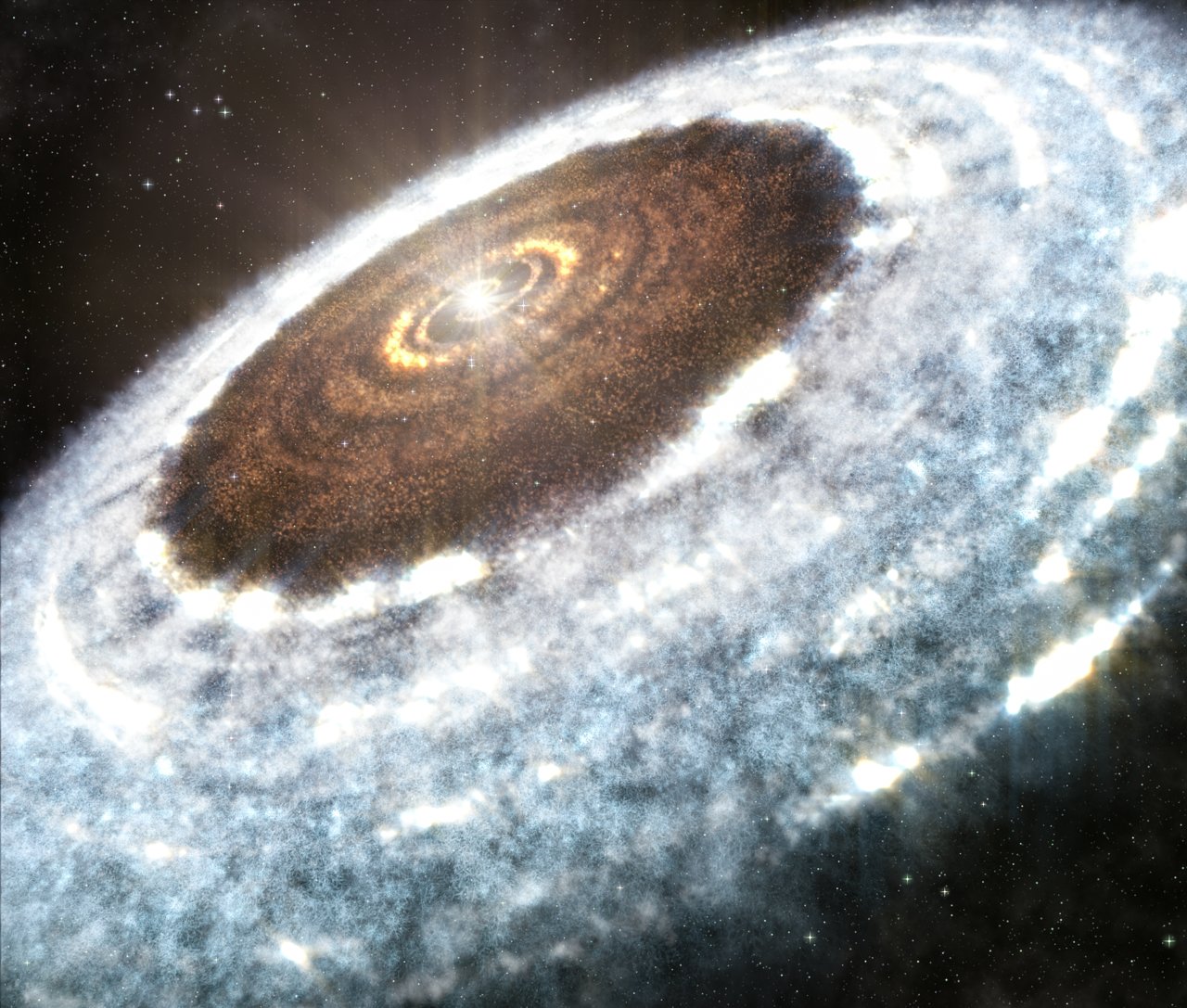 This artist’s impression of the water snowline around the young star V883 Orionis, as detected with ALMA. – Image Credit: A. Angelich (NRAO/AUI/NSF)/ALMA (ESO/NAOJ/NRAO)