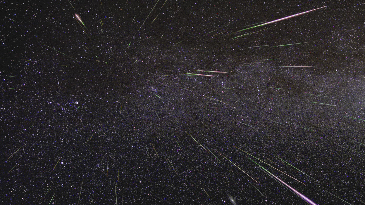 An outburst of Perseid meteors lights up the sky in August 2009 in this time-lapse image. Stargazers expect a similar outburst during next week’s Perseid meteor shower, which will be visible overnight on Aug. 11 and 12. – Image Credits: NASA/JPL