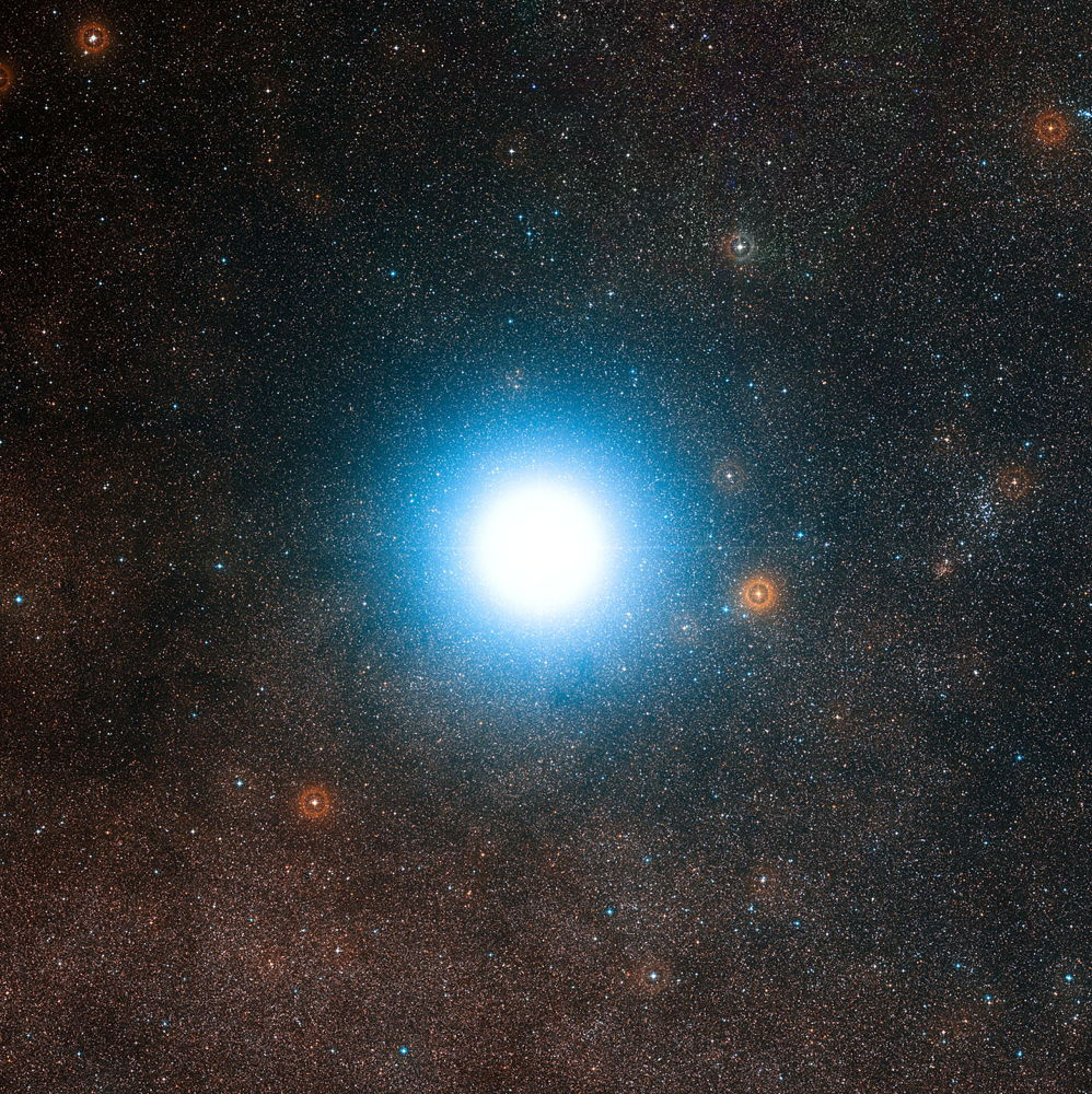 Wide-field view of the sky around the bright star Alpha Centauri - Image Credit: ESO/Digitized Sky Survey 2