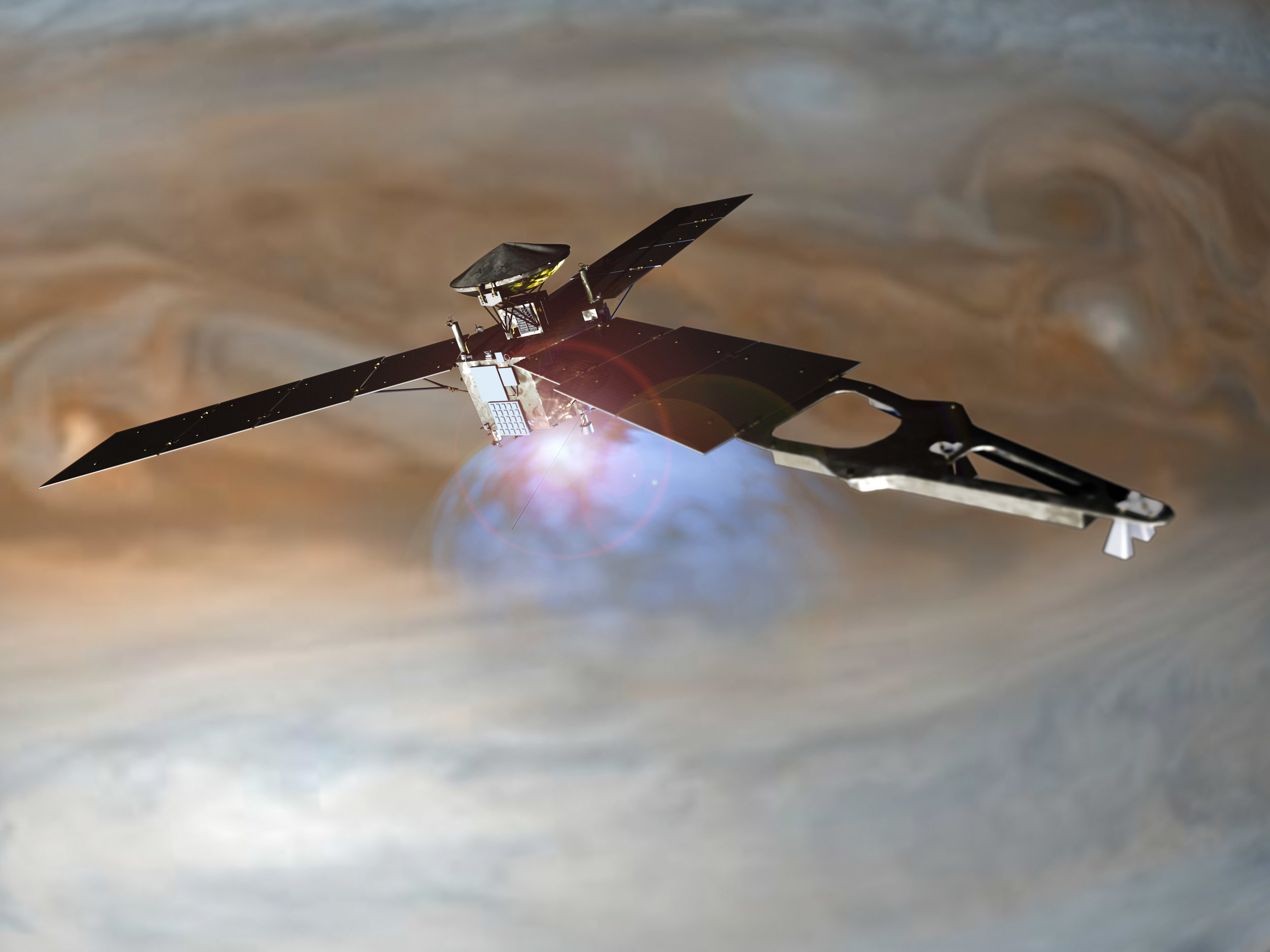 Illustration of NASA's Juno spacecraft firing its main engine to slow down and go into orbit around Jupiter. Lockheed Martin built the Juno spacecraft for NASA's Jet Propulsion Laboratory. Image Credit: NASA/Lockheed Martin