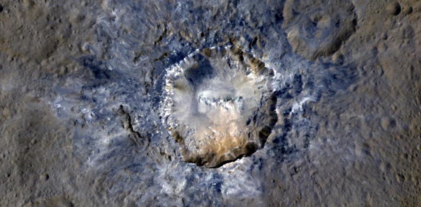 Ceres' Haulani Crater shows evidence of landslides from its crater rim. – Image Credit: NASA/JPL-Caltech/UCLA/MPS/DLR/IDA