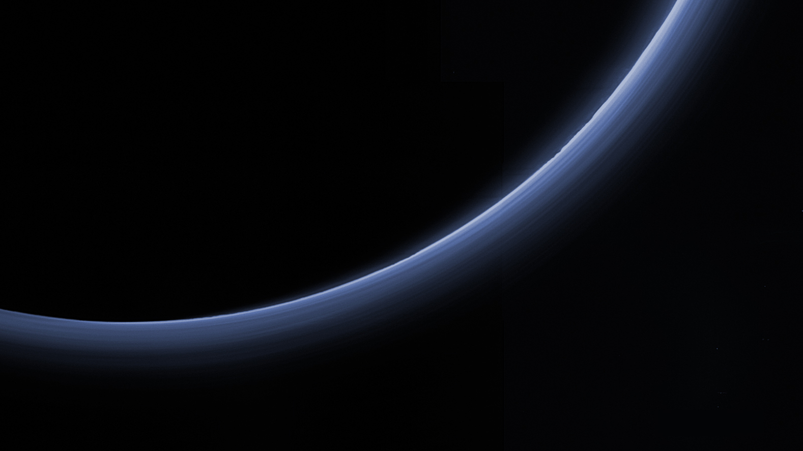 Pluto’s hazy atmosphere, made visible by scattered sunlight seen by New Horizons. - Image Credit: NASA/Johns Hopkins University Applied Physics Laboratory/Southwest Research Institute
