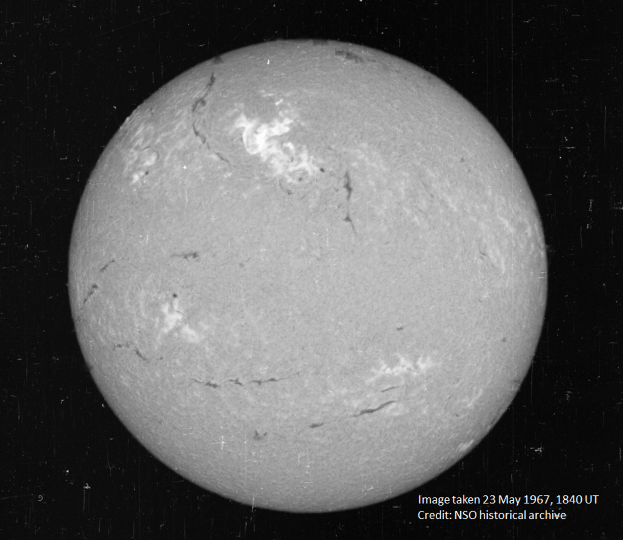 The great solar flare of 23 May 1967 (bright region in top half of solar image). Extreme emissions were recorded in the radio, visible, ultraviolet and X-ray portions of the electromagnetic spectrum. - Image Credit: NSO H alpha
