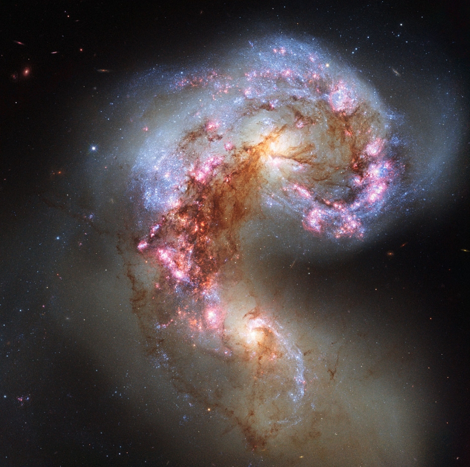 The Antennae galaxies, a pair of interacting galaxies located 45 – 65 million light years from Earth. Credit: Hubble / ESA