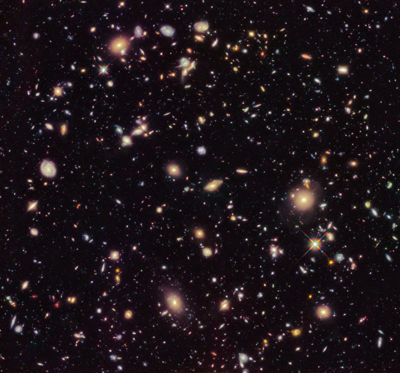 Light from the universe’s first galaxies destroyed the hydrogen atoms that formed during the Big Bang. - Image Credit: NASA, ESA, R. Ellis (Caltech), and the UDF 2012 Team , CC BY
