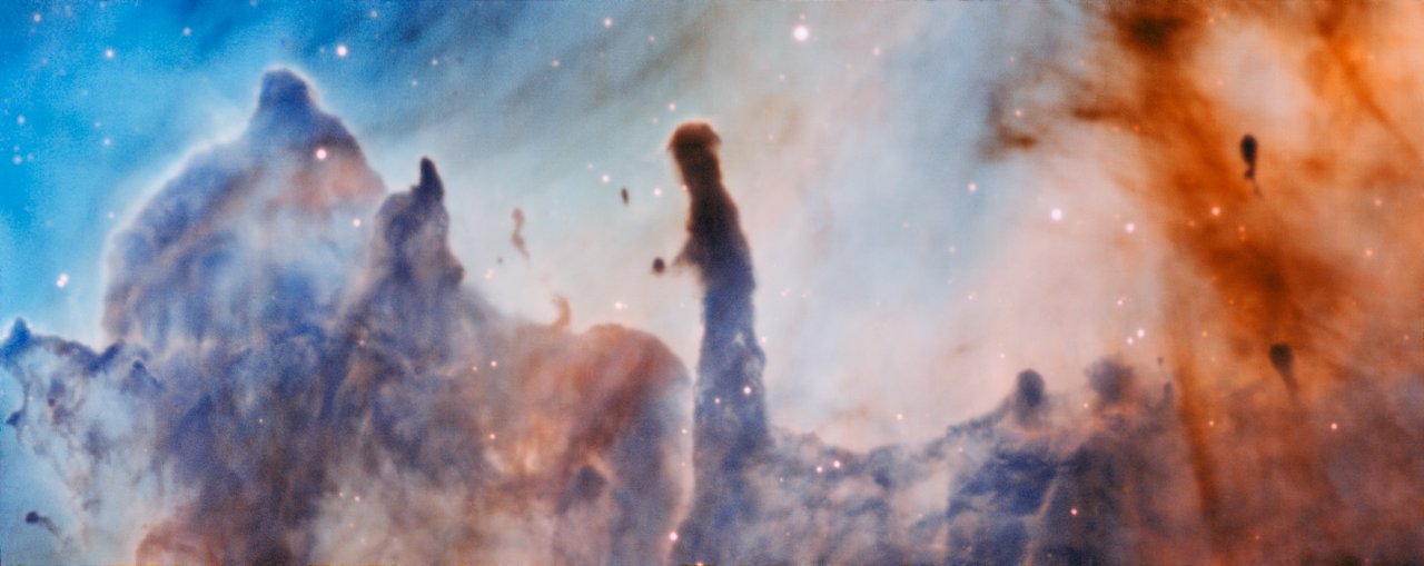 This image was taken by the MUSE instrument, mounted on ESO’s Very Large Telescope and shows the region R44 within the Carina Nebula, 7500 light-years away. The massive stars within the star formation region slowly destroy the pillars of dust and gas from which they are born. – Image Credit: ESO/A. McLeod