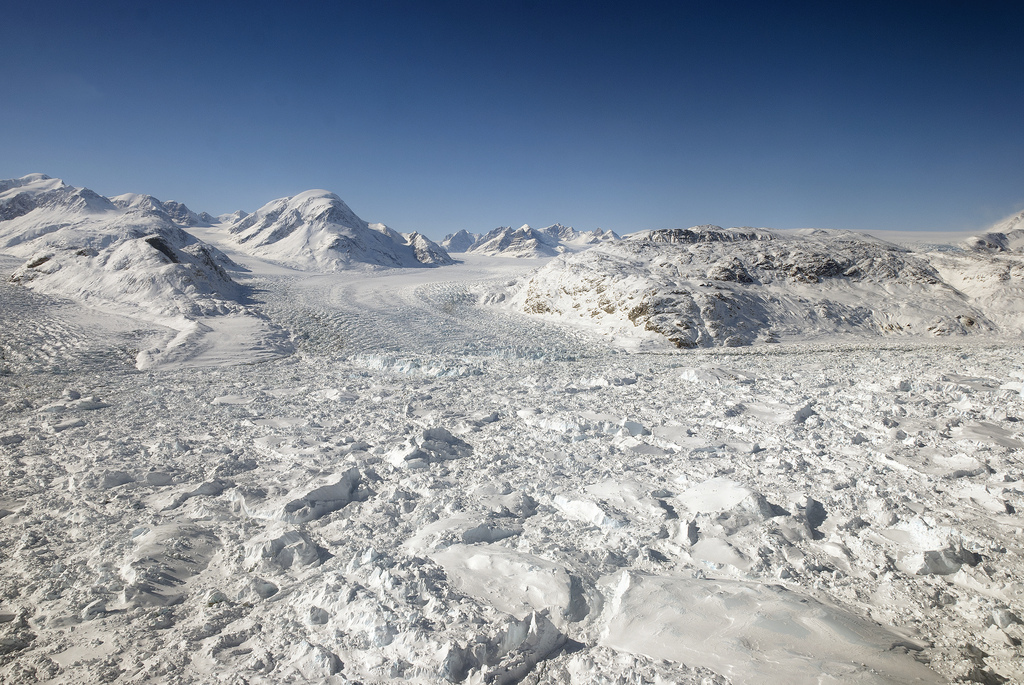 Floating ice at the calving front of Greenland’s Kangerdlugssuaq glacier, photographed in 2011 during Operation IceBridge. - Image Credit: NASA/Michael Studinger