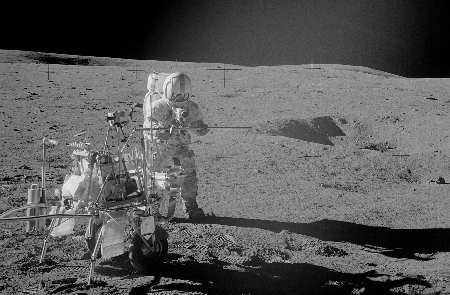Apollo 14 astronaut Al Bean collects samples in the region where the evidence of very early lunar crust formation comes from. - Image Credit: NASA, AS14-68-9405