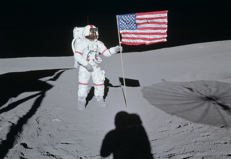 Astronaut Alan Shepard poses next to the American flag on the Moon during the Apollo 14 mission. - Image Credit: NASA