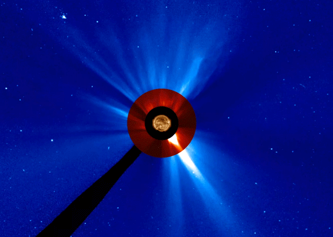 Combined images from NASA's Solar Dynamics Observatory (center) and the NASA/ESA Solar and Heliospheric Observatory (red and blue) show an impressive coronal mass ejection departing the far side of the sun on Sept. 1, 2014. This massive cloud raced away at about 5 million mph and likely accelerated particles that later produced gamma rays Fermi detected. – Image Credits: NASA/SDO and NASA/ESA/SOHO