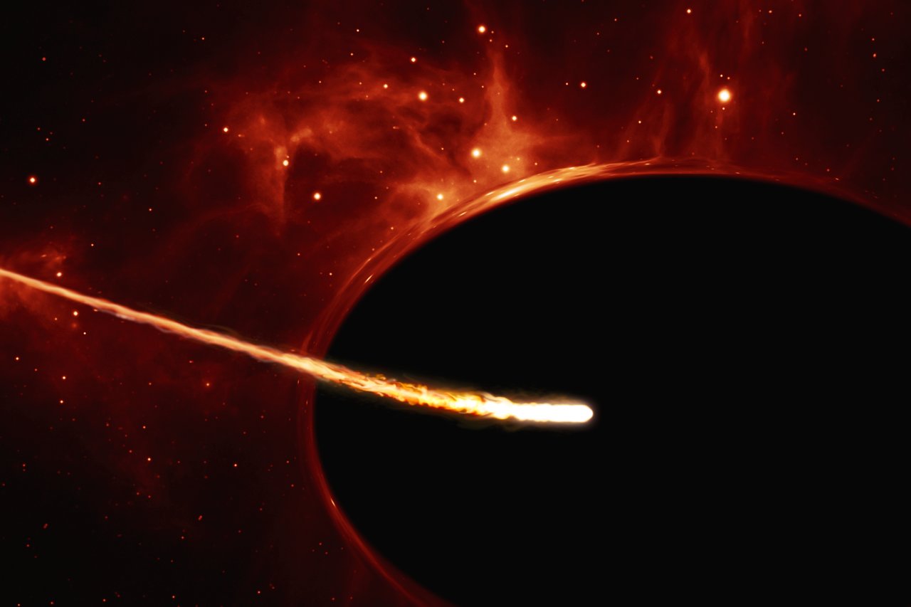 An artist’s impression of a Sun-like star close to a rapidly spinning supermassive black hole, with a mass of about 100 million times the mass of our Sun. - Image Credit: ESA/Hubble, ESO, M. Kornmesser
