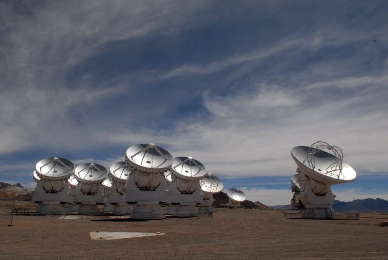 The ALMA array in Chile. Once ALMA was added to the Event Horizon Telescope, it increased the EHT’s power by a factor of 10. - Image Credit: ALMA (ESO/NAOJ/NRAO), O. Dessibourg