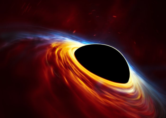Artist’s impression depicts a rapidly spinning supermassive black hole surrounded by an accretion disc. - Image Credit: ESA/Hubble, ESO, M. Kornmesse