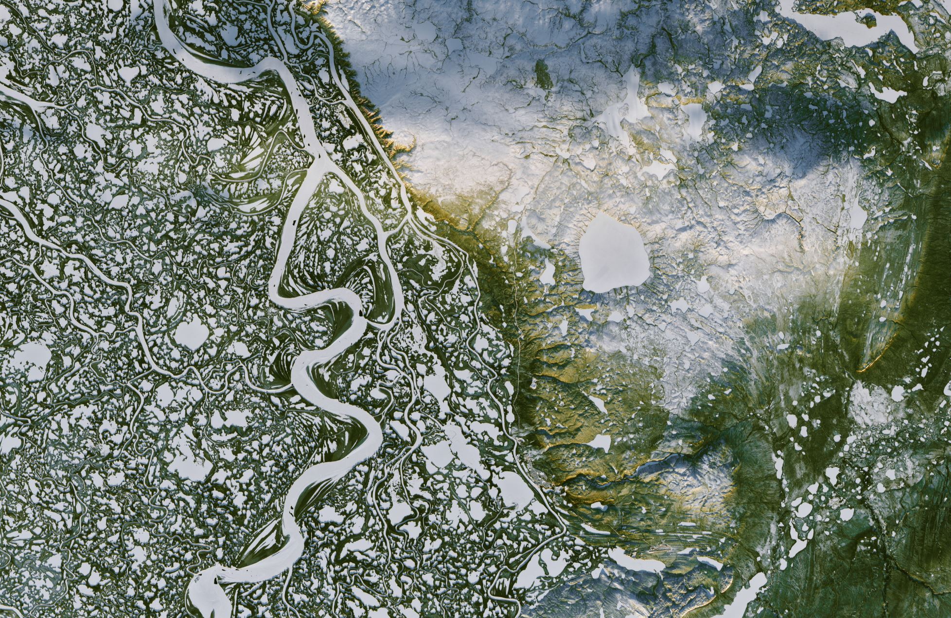 Image Credit: NASA Earth Observatory images by Joshua Stevens, using Landsat data from the U.S. Geological Survey - Caption: Pola Lem