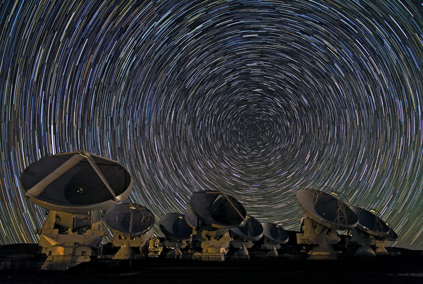 The Atacama Large Millimeter/submillimeter Array is made up of 66 antennas, all pointed at the sky collecting data 24 hours a day. - Image Credit: ESO/B. Tafreshi (twanight.org)