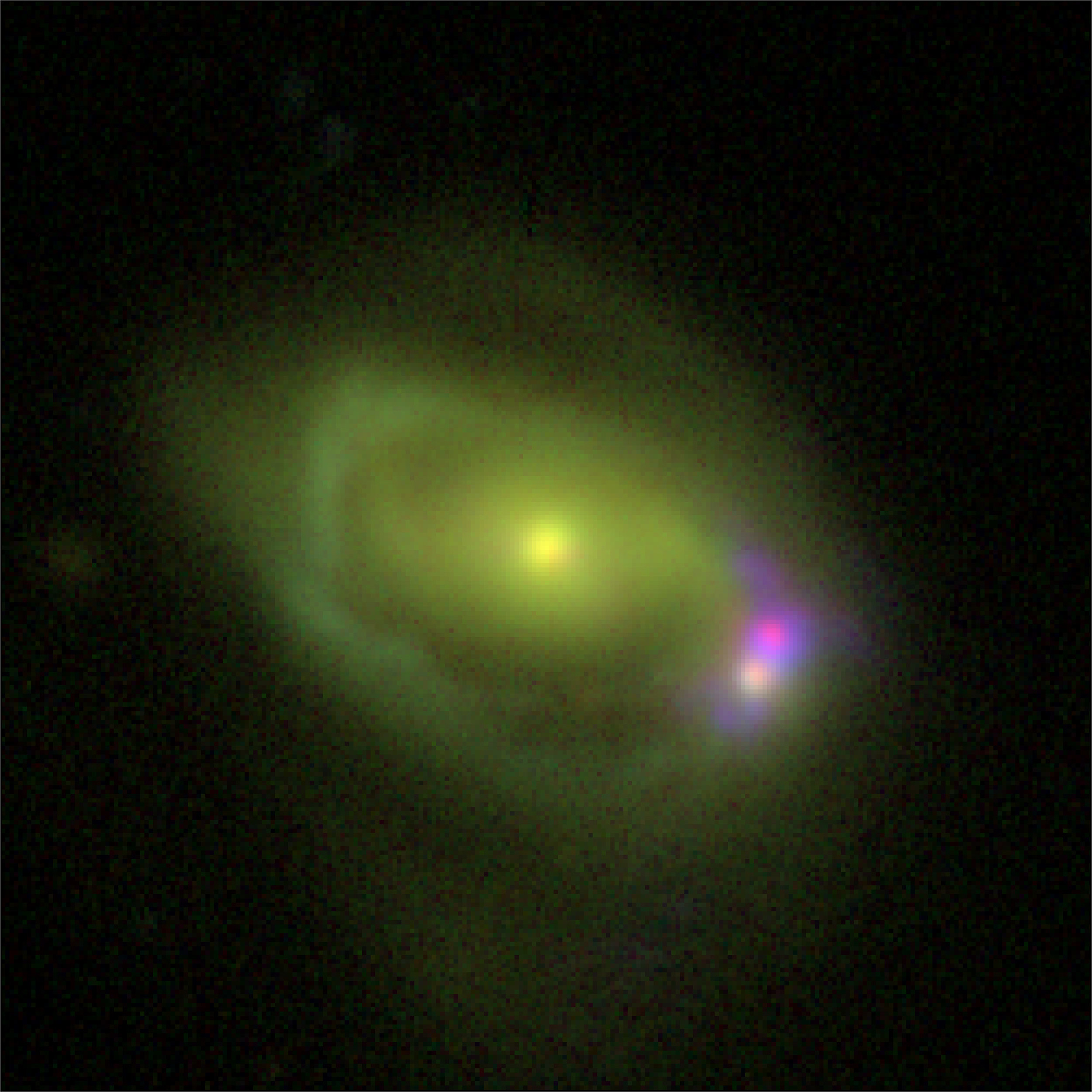This optical image shows the Was 49 system, which consists of a large disk galaxy, Was 49a, merging with a much smaller "dwarf" galaxy Was 49b. - Image Credits: DCT/NRL