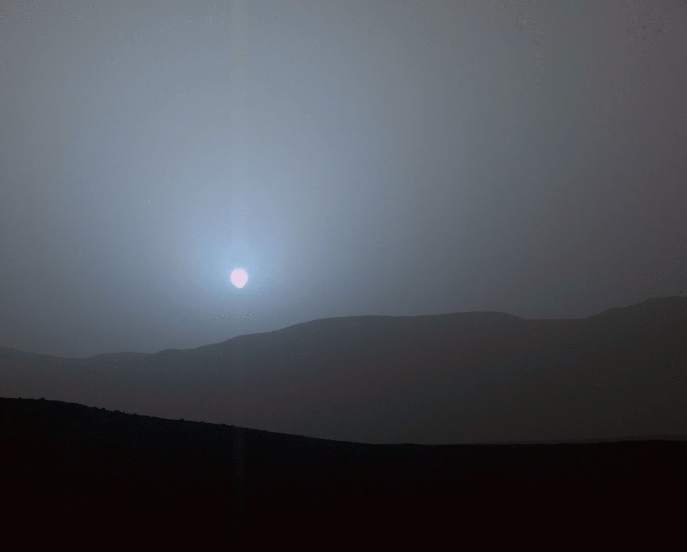 Sunset photographed from Gale Crater by the Mars Curiosity rover on April 15, 2015 taken using the left eye of the rover’s Mastcam. - Image Credit: NASA/JPL-Caltec
