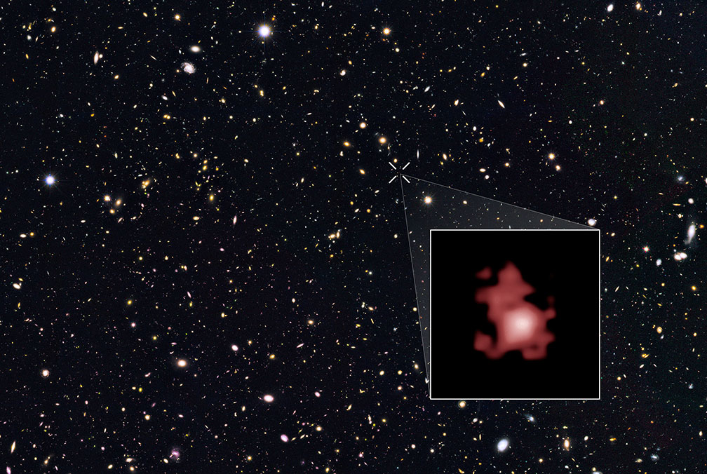 Galaxy GN-z11, shown in the inset, is seen as it was 13.4 billion years in the past, just 400 million years after the big bang, when the universe was only three percent of its current age. The galaxy is ablaze with bright, young, blue stars, but looks red in this image because its light has been stretched to longer spectral wavelengths by the expansion of the universe. - Image Credit: NASA, ESA, P. Oesch, G. Brammer, P. van Dokkum, and G. Illingworth