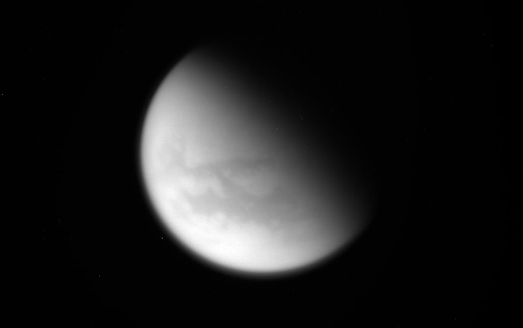 This unprocessed image of Saturn's moon Titan was captured by NASA's Cassini spacecraft during its final close flyby of the hazy, planet-sized moon on April 21, 2017. - Image Credits: NASA/JPL-Caltech/Space Science Institute