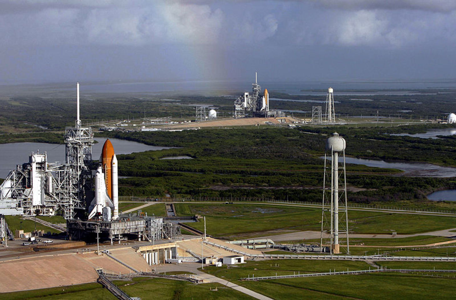 If the shape of space is flat, then two rockets will never ever meet. - Image Credit: NASA/Troy Cryder