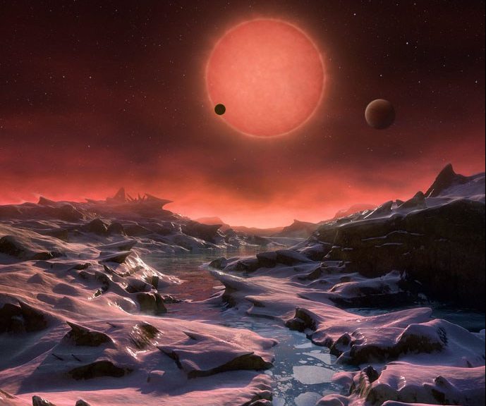 Artist’s impression of the view from the most distant exoplanet discovered around the red dwarf star TRAPPIST-1. - Image Credit: ESO/M. Kornmesser.
