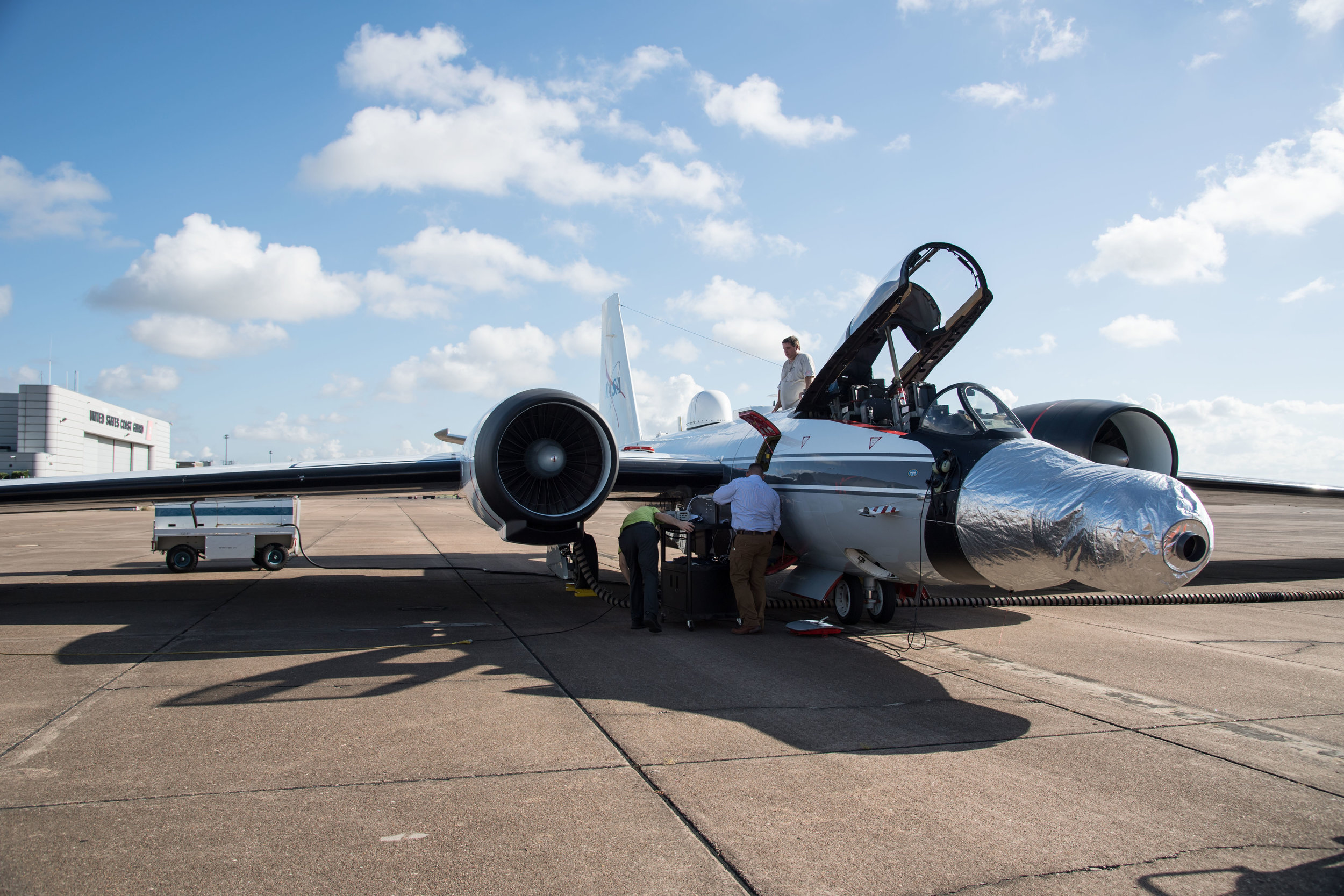 One of the WB-57F jets is readied for a test run at NASA’s Johnson Space Center in Houston. The instruments are mounted under the silver casing on the nose of the plane. - Image Credits: NASA’s Johnson Space Center/Norah Moran