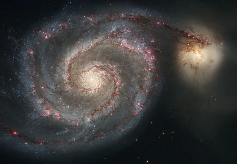 The Whirlpool Galaxy (Spiral Galaxy M51, NGC 5194), a classic spiral galaxy located in the Canes Venatici constellation, and its companion NGC 5195. - Image Credit: NASA/ESA