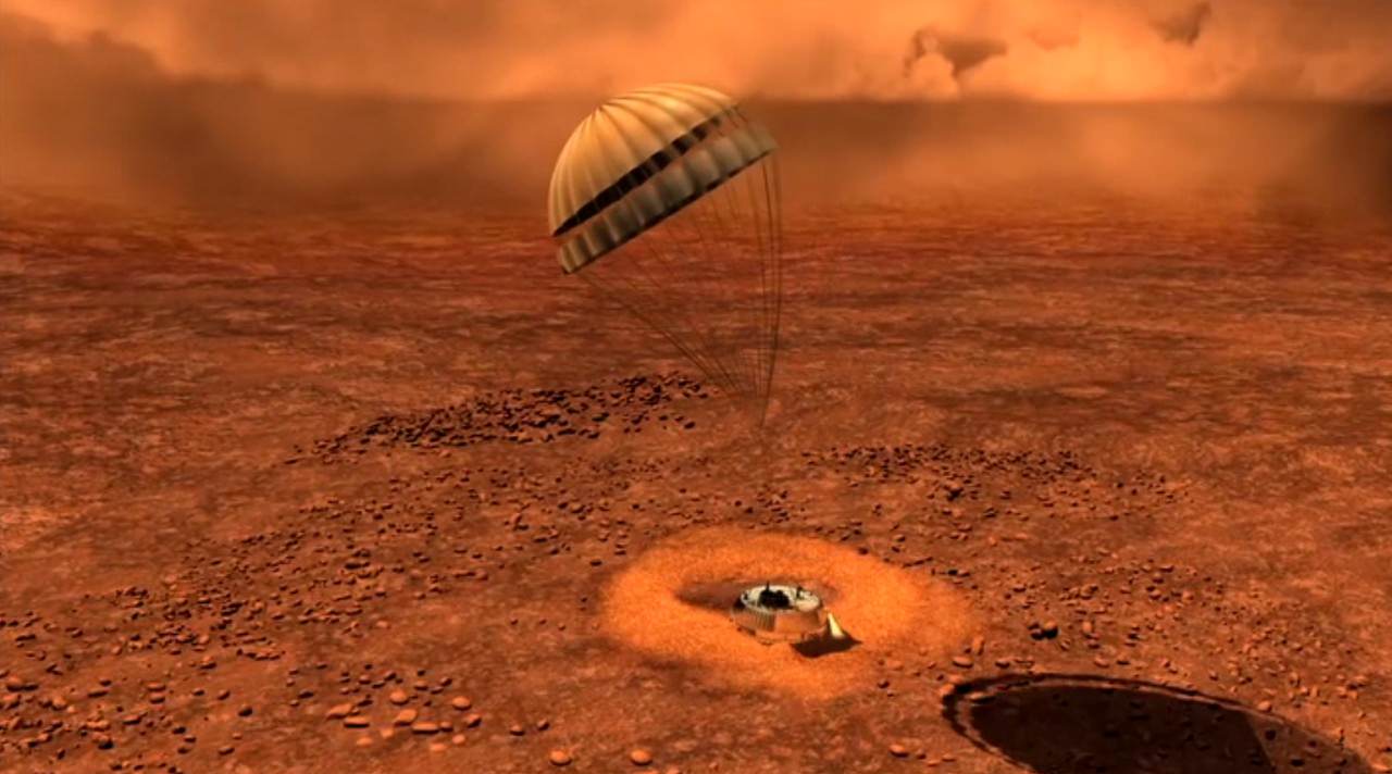 Artist depiction of Huygens lander touching down on the surface of Saturn’s largest moon Titan. - Image Credit: ESA