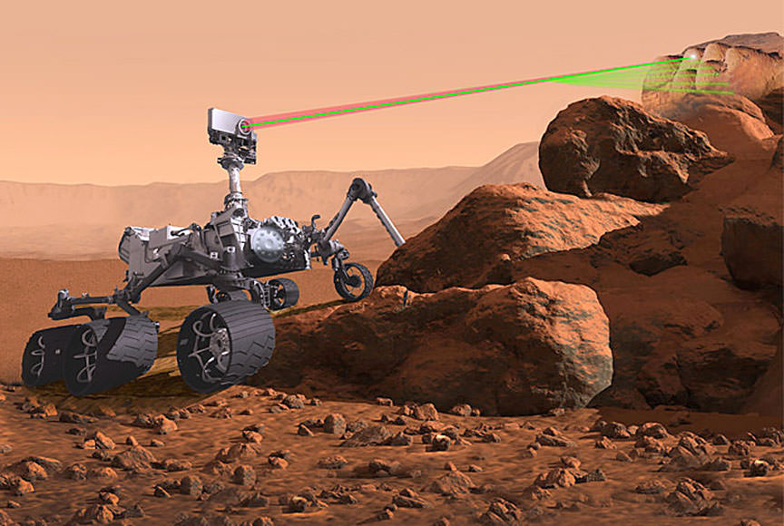 The microphone for the upcoming Mars mission will be attached to the SuperCam, seen here in this illustration zapping a rock with its laser. - Image Credit: NASA/JPL-Caltech