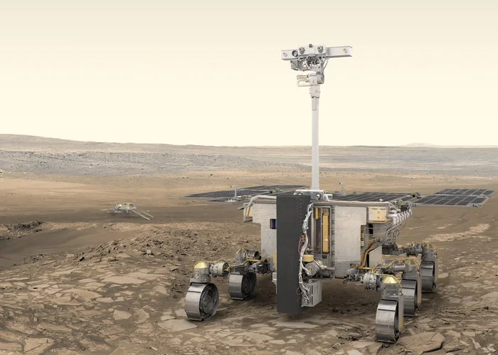 Artist’s impression of ESA’s ExoMars rover (foreground) and Russia’s stationary surface science platform (background) on the surface of Mars. - Image Credit: ESA/ATG medialab
