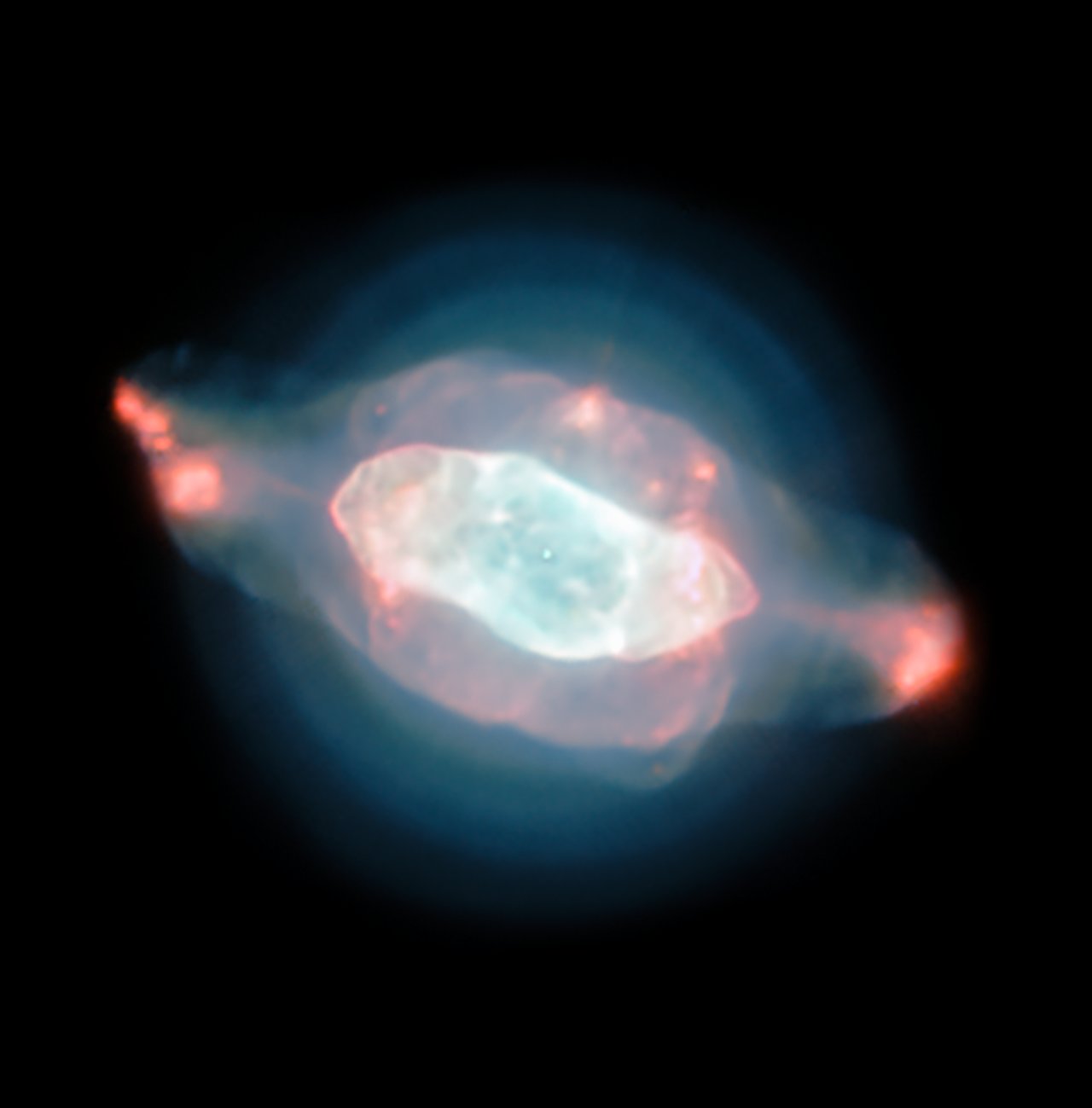 The spectacular planetary nebula NGC 7009, or the Saturn Nebula, emerges from the darkness like a series of oddly-shaped bubbles, lit up in glorious pinks and blues. This colourful image was captured by the powerful MUSE instrument on ESO’s Very Large Telescope (VLT), as part of a study which mapped the dust inside a planetary nebula for the first time. - Image Credit: ESO/J. Walsh