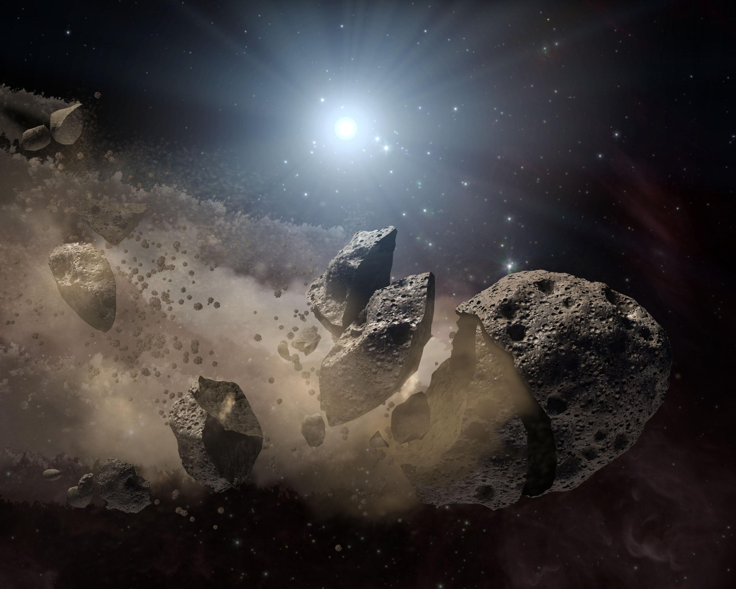 An artist's impression of a Nearth-Earth Asteroid (NEA) breaking up. - Image Credit: NASA/JPL-Caltech
