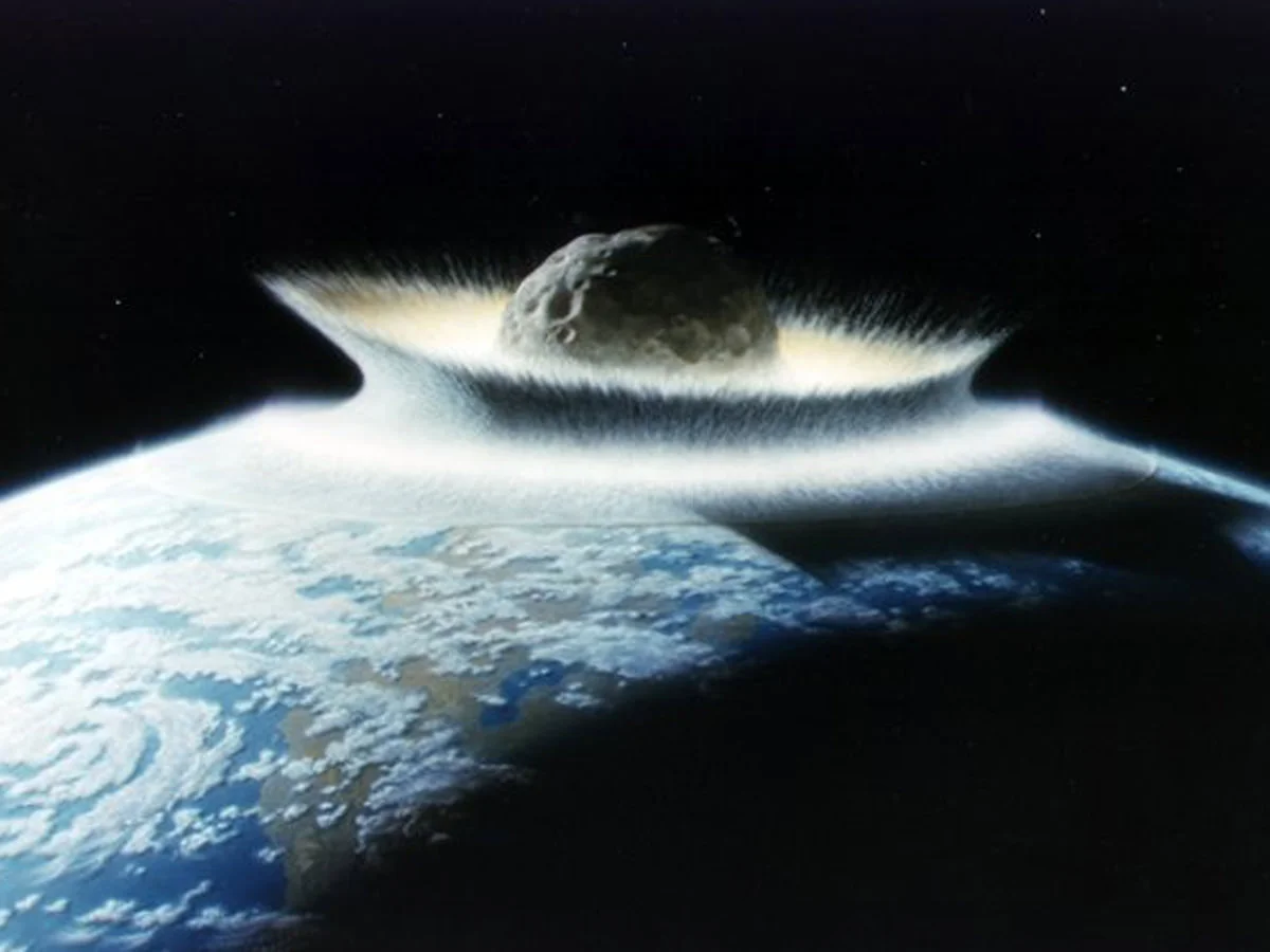 When an asteroid struck the Yucatan region about 66 million years ago, it wiped out the dinosaurs, and most of life on Earth. If it had hit elsewhere, the dinosaurs might well have survived. - Image Credit: NASA/Don Davis
