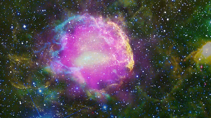 This multiwavelength composite shows the supernova remnant IC 443, also known as the Jellyfish Nebula - Image Credit: NASA/DOE/Fermi LAT Collaboration, NOA/AURA/NSF, JPL-Caltech/UCLA via Wikimedia Commons