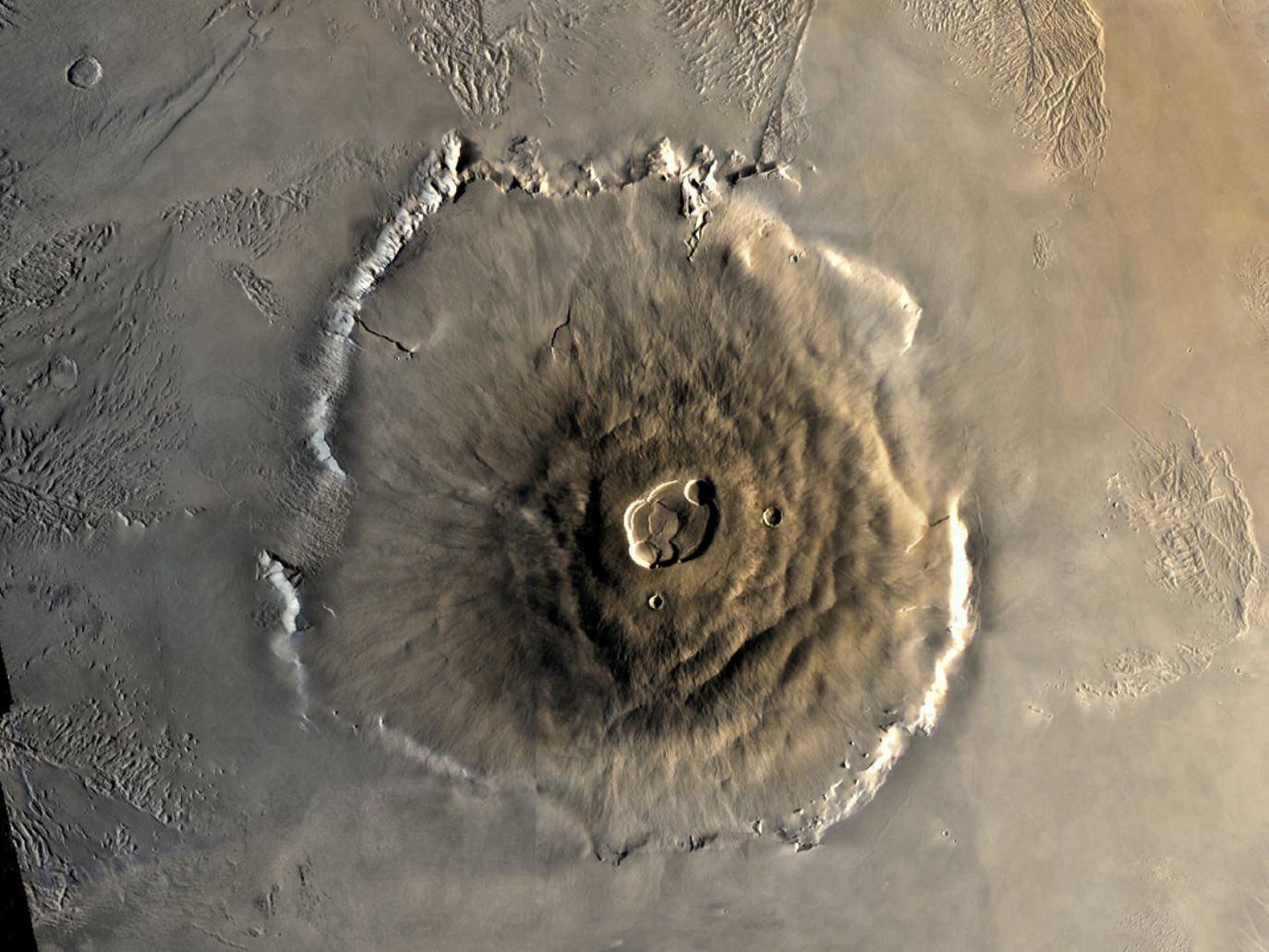 Color mosaic of Mars’ greatest mountain, Olympus Mons, viewed from orbit. - Image Credit NASA/JPL