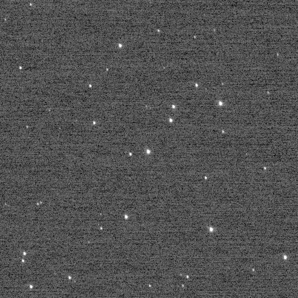For a short time, this New Horizons Long Range Reconnaissance Imager (LORRI) frame of the "Wishing Well" star cluster, taken Dec. 5, 2017, was the farthest image ever made by a spacecraft, breaking a 27-year record set by Voyager 1. About two hours later, New Horizons later broke the record again. - Image Credit: NASA/JHUAPL/SwRI
