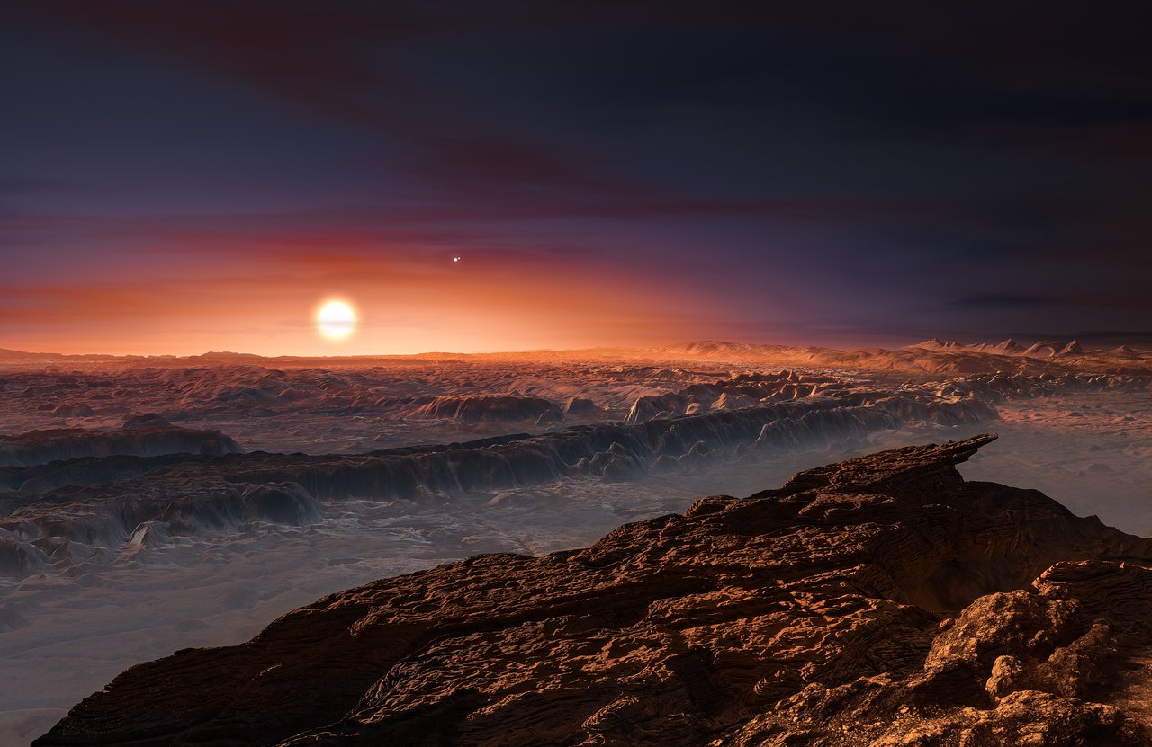 Artist’s impression of the surface of the planet Proxima b orbiting the red dwarf star Proxima Centauri. The double star Alpha Centauri AB is visible to the upper right of Proxima itself. - Image Credit: ESO