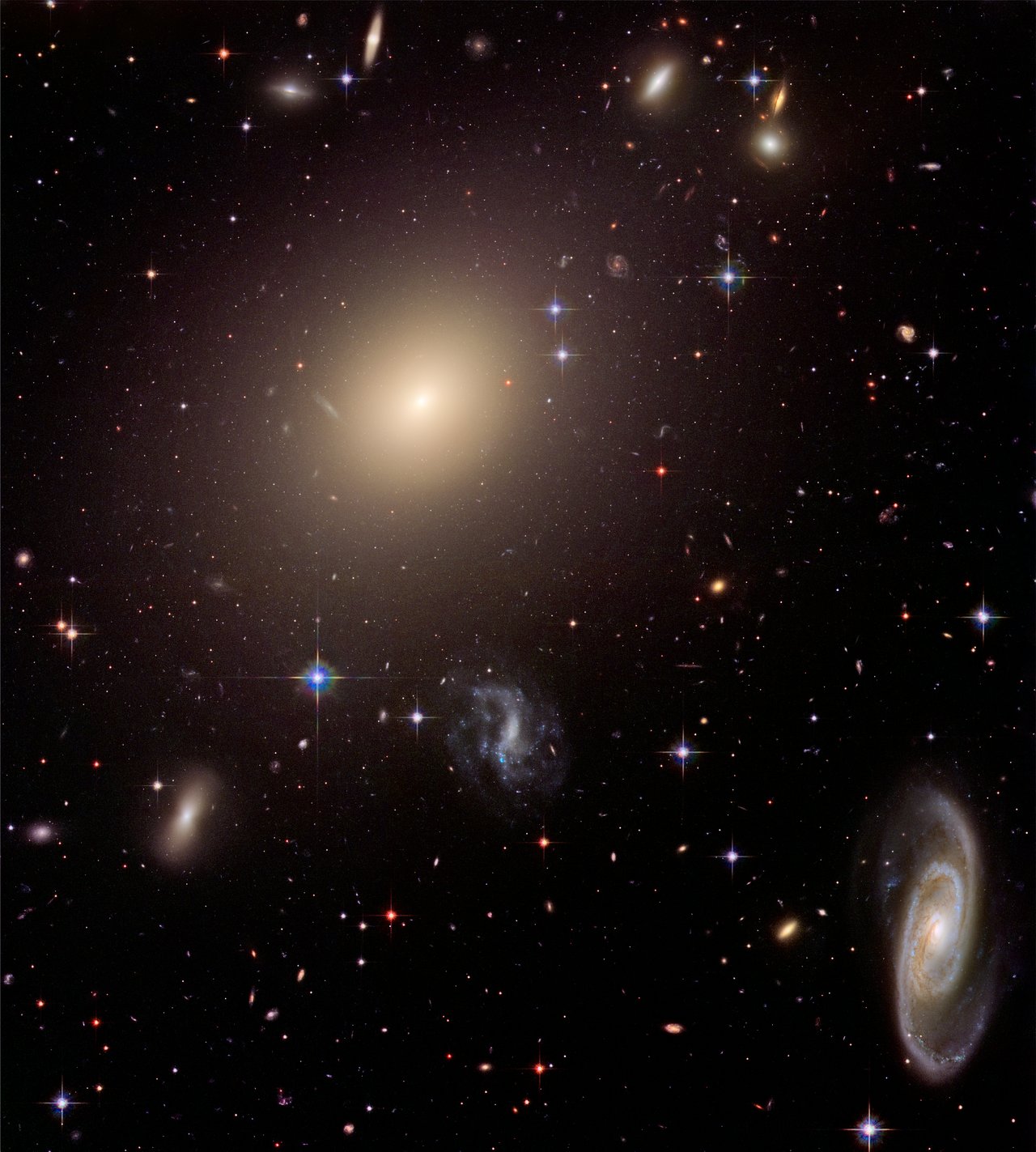 When galaxies align - Image Credit: NASA , ESA , and The Hubble Heritage Team ( STScI / AURA ) - (Click to enlarge)