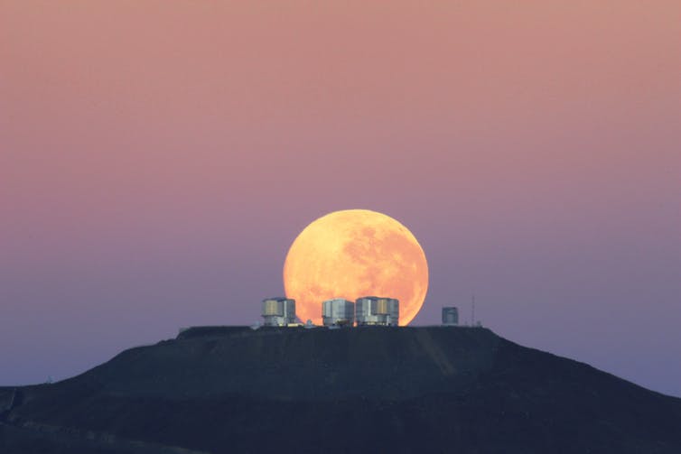 Moonset over the Very Large Telescope. - Image Credit: G.Gillet/ESO, CC BY-SA .