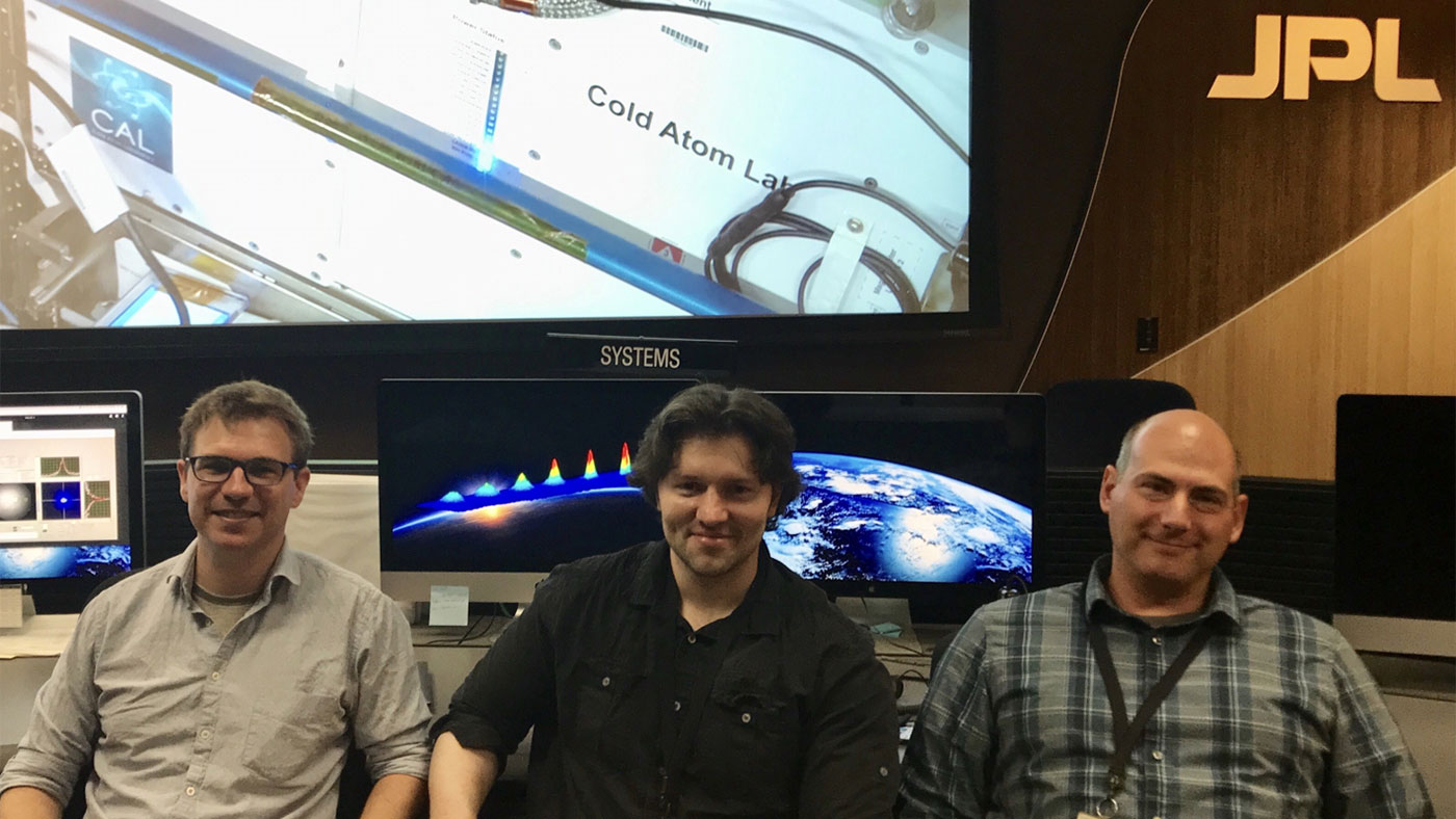 JPL scientists and members of the Cold Atom Lab’s atomic physics team (left to right) David Aveline, Ethan Elliott and Jason Williams. - Image Credit: NASA/JPL-Caltech