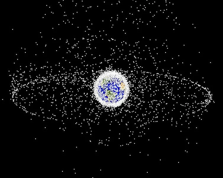 A computer-generated image of objects in Earth orbit that are currently being tracked. Approximately 95 percent of the objects in this illustration are orbital debris – not functional satellites. The dots represent the current location of each item. The orbital debris dots are scaled according to the image size of the graphic to optimize their visibility and are not scaled to Earth. - Image Credit: NASA via Wikimedia Commons