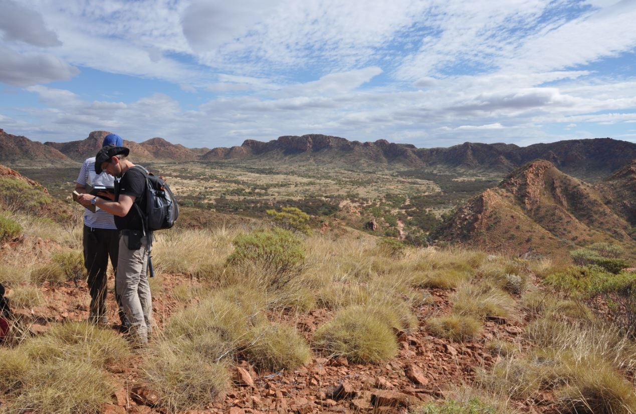 Scientists working at the central peak of Gosses Bluff meteorite crater in Northern Territory. Nick Timms , Author provided
