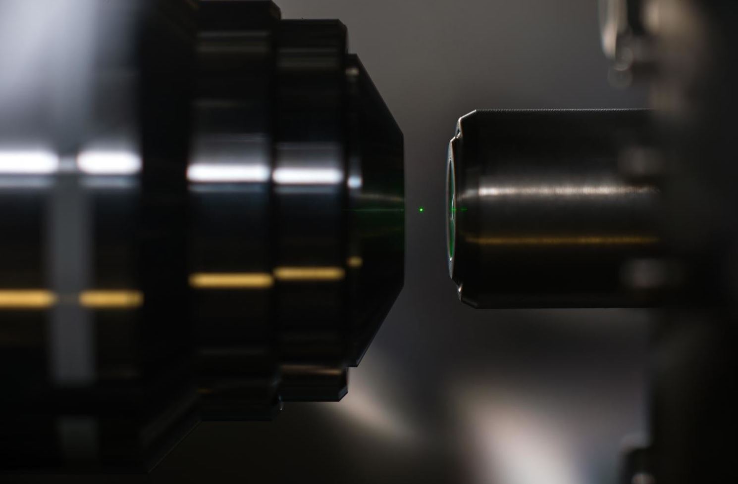 A silica sphere with a radius of 50 nanometers is trapped levitating in a beam of light. - Image Credit: J. Adam Fenster, University of Rochester, CC BY-SA