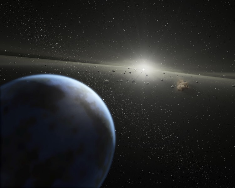 Artist’s impression of a massive asteroid belt in orbit around a star. Earth’s water may not have all come from asteroids and comets, so maybe that’s true for exoplanets. - Image Credit: NASA-JPL / Caltech / T. Pyle (SSC)