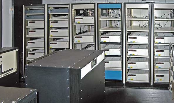 Atomic clocks have been in use for decades. This image shows banks of atomic clocks at the US Naval Observatory, used to define the time standard for the US Dept. of Defense. - Image Credit: US Naval Observatory via Wikimedia Commons